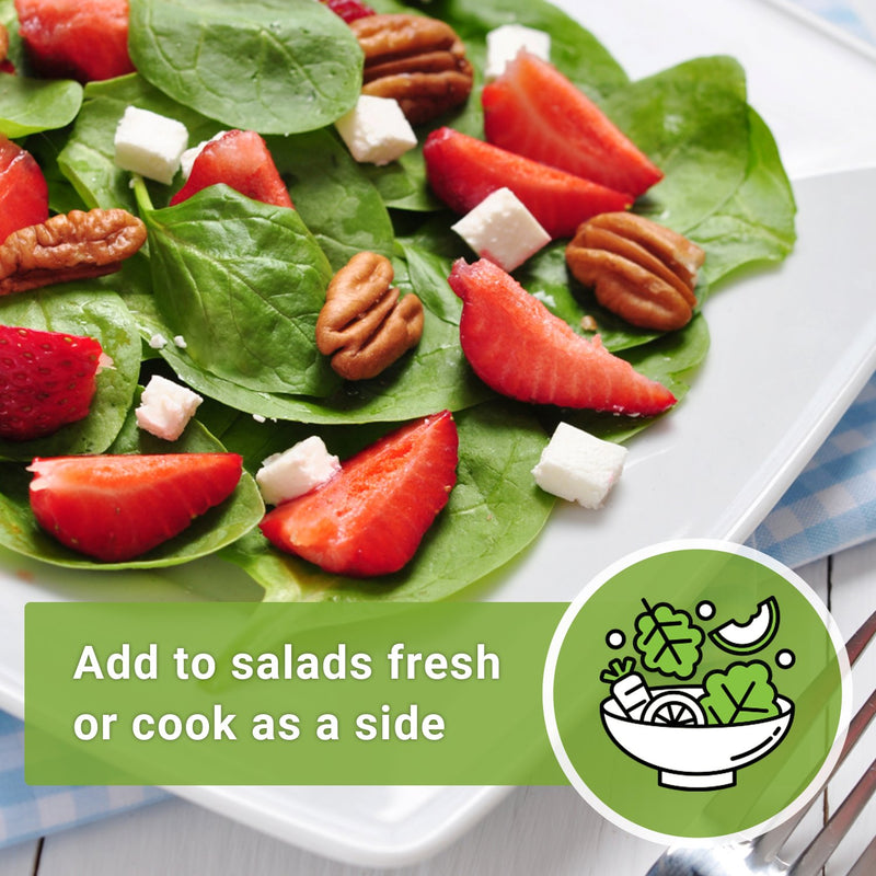 spinach leaves decorated with fruits and nuts add to salads fresh or cook as a side